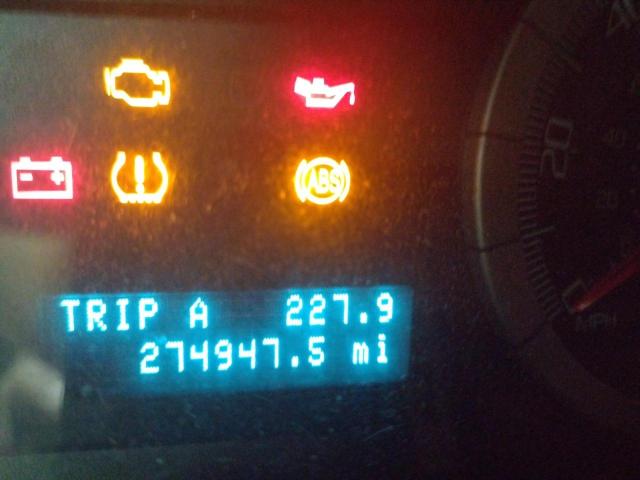 Photo 8 from auction – 2009 FORD ESCAPE LIM with VIN 1FMCU04G99KA22097