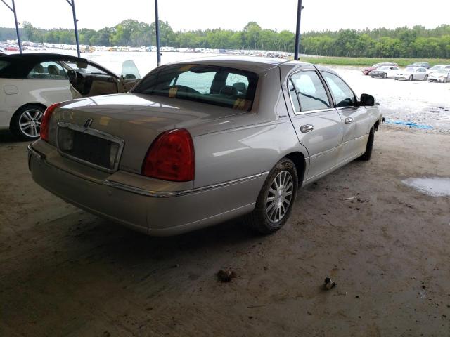Photo 4 from auction – 2004 LINCOLN TOWN CAR E with VIN 1LNHM81W34Y650579