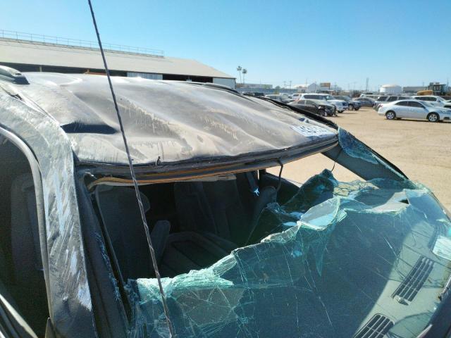 Photo 9 from auction – 2003 GMC YUKON with VIN 1GKEC13V43J335145