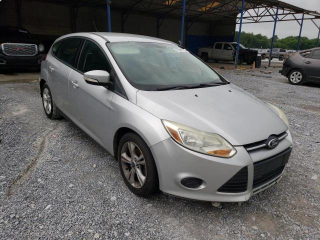 FORD FOCUS SE 2014 with VIN 1FADP3K23EL400031 - Photo from auction