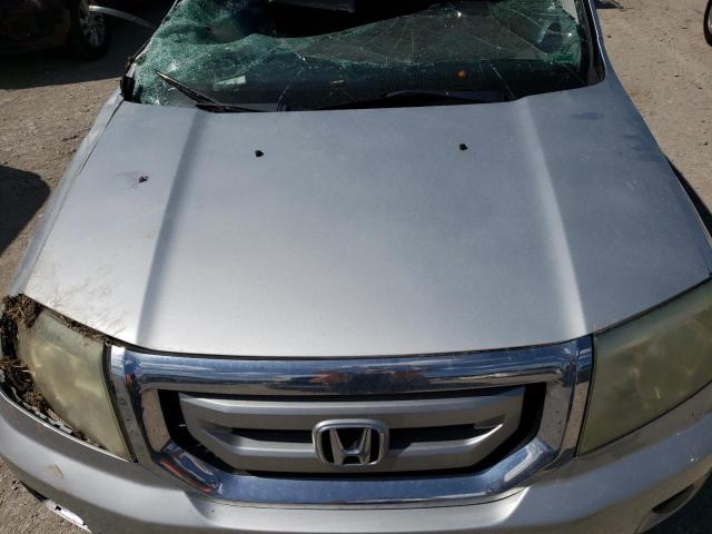 Photo 7 from auction – 2009 HONDA PILOT LX with VIN 5FNYF48229B011773