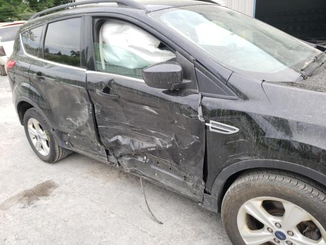 Photo 9 from auction – 2014 FORD ESCAPE SE with VIN 1FMCU9G90EUC26996