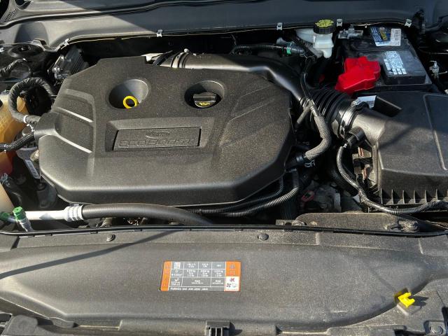 Photo 7 from auction – 2018 FORD FUSION TIT with VIN 3FA6P0D91JR142668