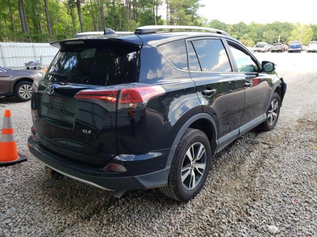 Photo 4 from auction – 2016 TOYOTA RAV4 XLE with VIN 2T3WFREV4GW295983