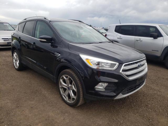 FORD ESCAPE TIT 2017 with VIN 1FMCU9J96HUA48590 - Photo from auction