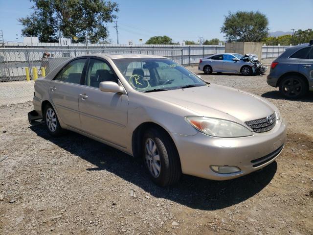 TOYOTA CAMRY LE 2004 with VIN JTDBF32K840152623 - Photo from auction