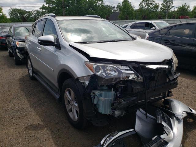 TOYOTA RAV4 XLE 2014 with VIN JTMRFREV7ED065409 - Photo from auction