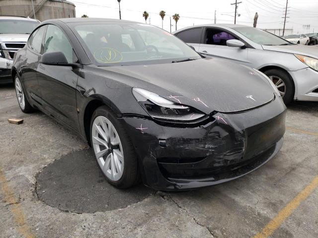 TESLA MODEL 3 2022 with VIN 5YJ3E1EB0NF143554 - Photo from auction