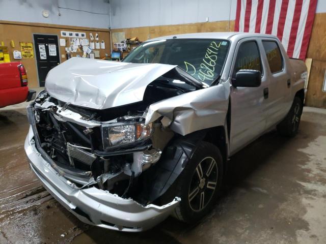 Photo 2 from auction – 2014 HONDA RIDGELINE with VIN 5FPYK1F75EB014645
