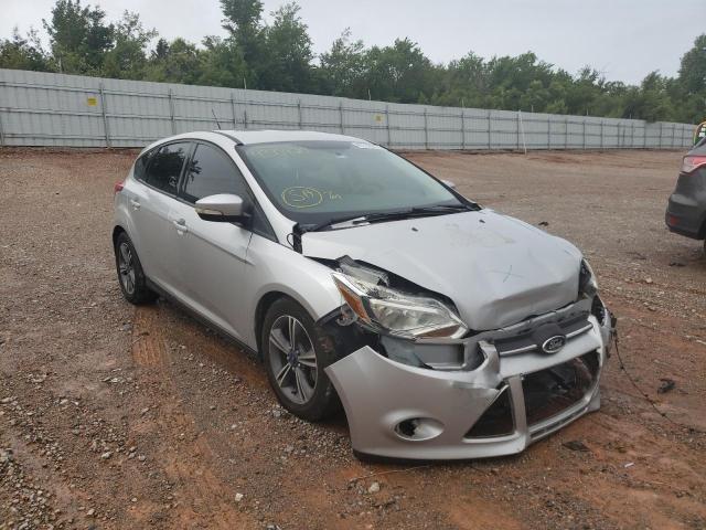 FORD FOCUS SE 2014 with VIN 1FADP3K2XEL430420 - Photo from auction