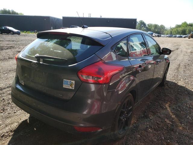 Photo 4 from auction – 2016 FORD FOCUS SE with VIN 1FADP3K28GL384847