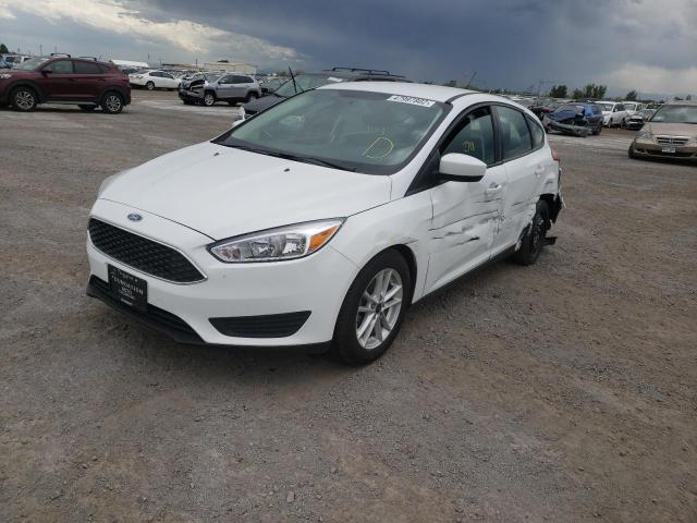Photo 2 from auction – 2018 FORD FOCUS SE with VIN 1FADP3K27JL331077