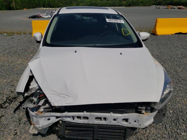 Photo 9 from auction – 2015 FORD FOCUS SE with VIN 1FADP3K22FL201456
