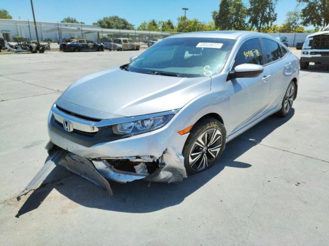 Photo 2 from auction – 2018 HONDA CIVIC EX with VIN JHMFC1F31JX014571