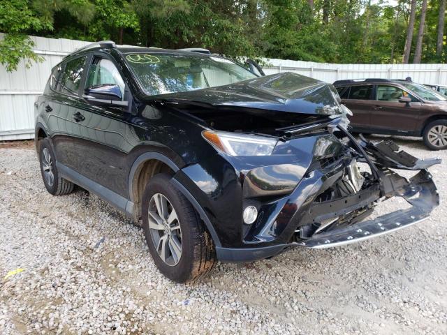 TOYOTA RAV4 XLE 2016 with VIN 2T3WFREV4GW295983 - Photo from auction