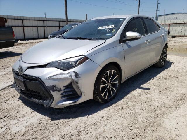 Photo 2 from auction – 2018 TOYOTA COROLLA L with VIN 5YFBURHE5JP810121