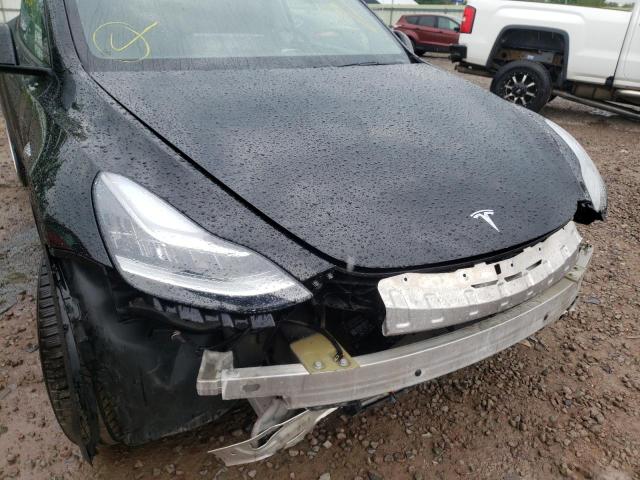 Photo 9 from auction – 2021 TESLA MODEL Y with VIN 5YJYGDEE9MF066564