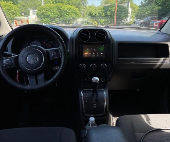 Photo 9 from auction – 2012 JEEP COMPASS LA with VIN 1C4NJDEB9CD537645