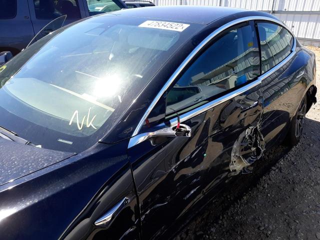 Photo 10 from auction – 2019 TESLA MODEL 3 with VIN 5YJ3E1EA6KF305951