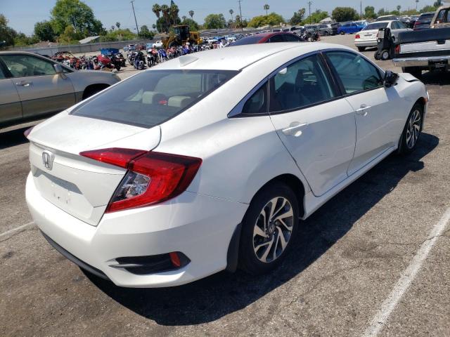 Photo 4 from auction – 2017 HONDA CIVIC EX with VIN 2HGFC2F70HH519544