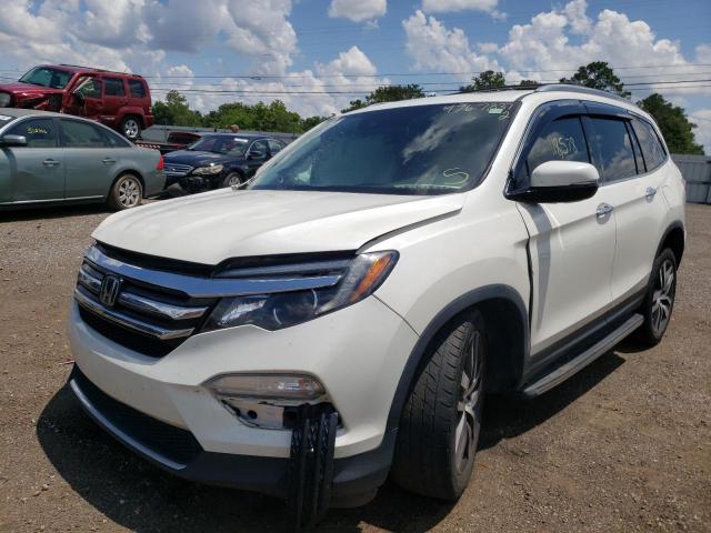 Photo 2 from auction – 2017 HONDA PILOT TOUR with VIN 5FNYF5H96HB032661