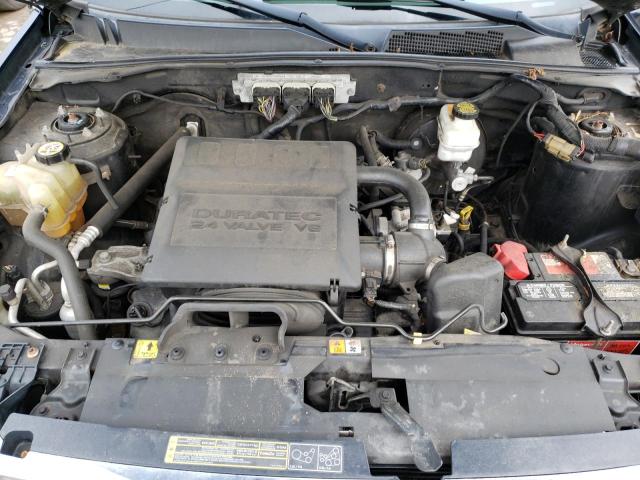 Photo 7 from auction – 2009 FORD ESCAPE LIM with VIN 1FMCU94G79KB71046