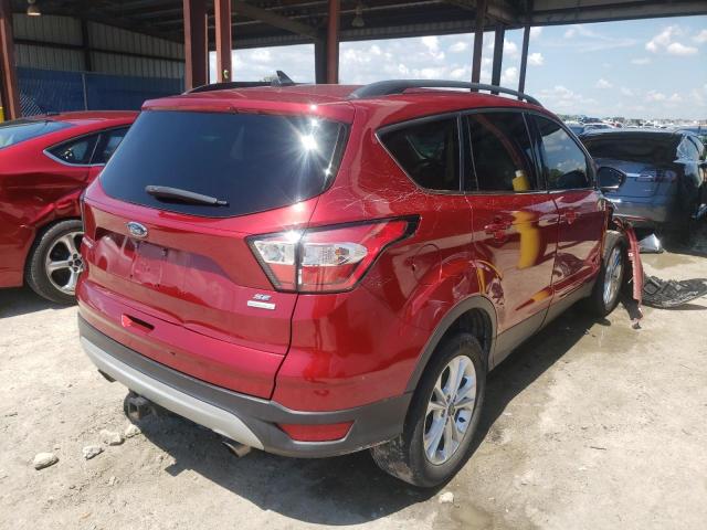 Photo 4 from auction – 2018 FORD ESCAPE SE with VIN 1FMCU0GD2JUB47744