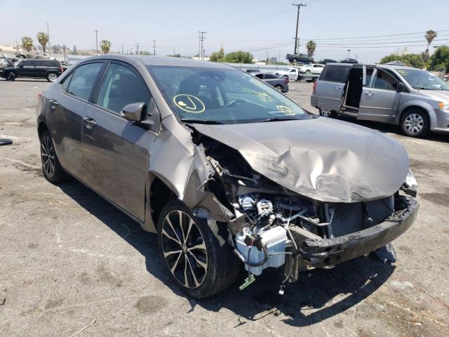 TOYOTA COROLLA L 2018 with VIN 5YFBURHE0JP769705 - Photo from auction