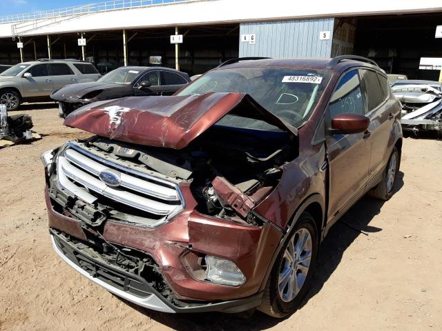 Photo 2 from auction – 2018 FORD ESCAPE SE with VIN 1FMCU0GD2JUC09532