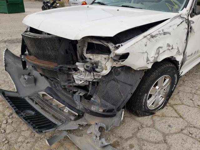 Photo 9 from auction – 2010 MERCURY MARINER with VIN 4M2CN8B74AKJ10248