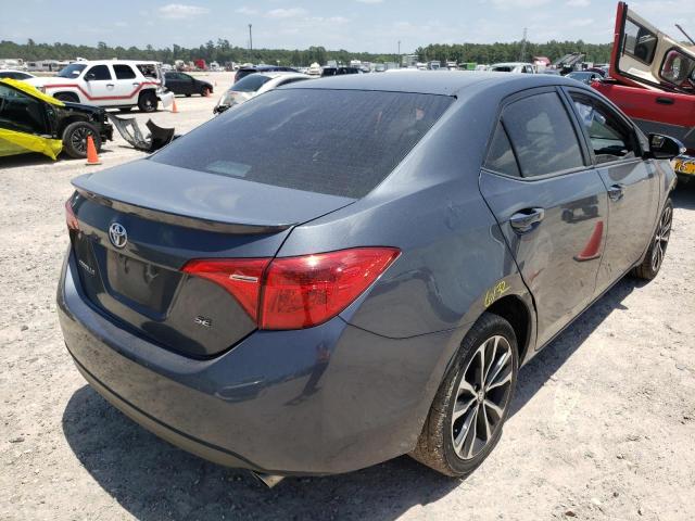 Photo 4 from auction – 2017 TOYOTA COROLLA L with VIN 5YFBURHE7HP701993