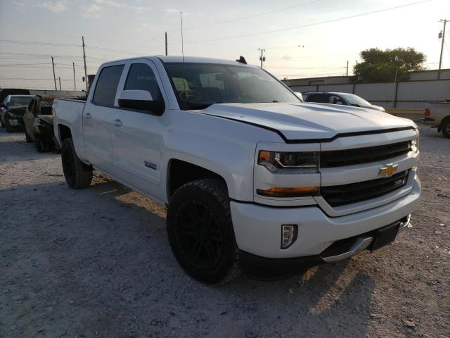 CHEVROLET silverado 2018 with VIN 3GCUKREC7JG211261 - Photo from auction