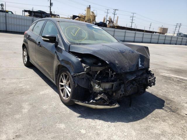 FORD FOCUS SE 2015 with VIN 1FADP3K29FL326986 - Photo from auction