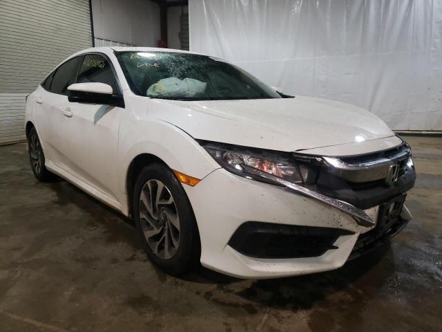 HONDA CIVIC EX 2018 with VIN 19XFC2F7XJE204038 - Photo from auction