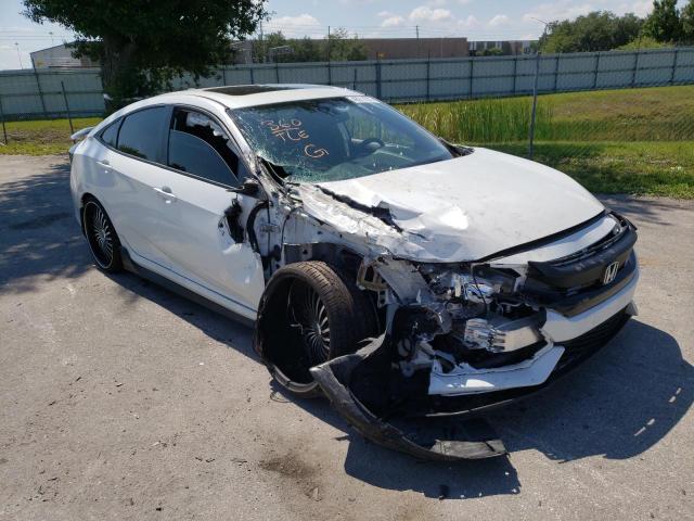 HONDA CIVIC SI 2019 with VIN 2HGFC1E5XKH704458 - Photo from auction