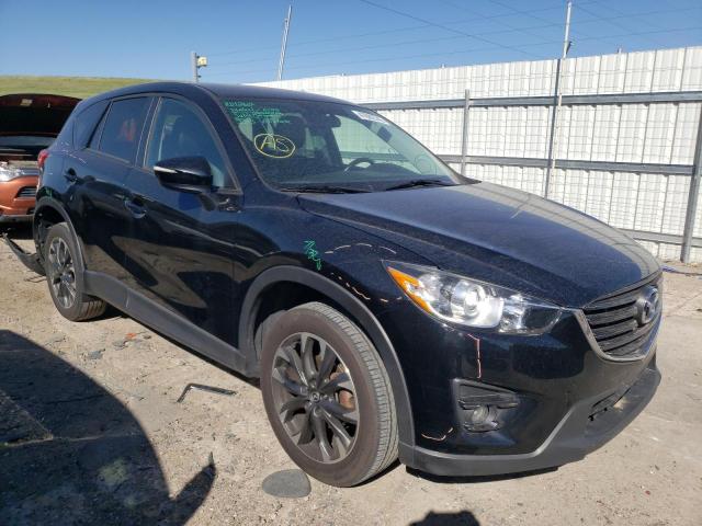 MAZDA CX-5 GT 2016 with VIN JM3KE4DY8G0744688 - Photo from auction