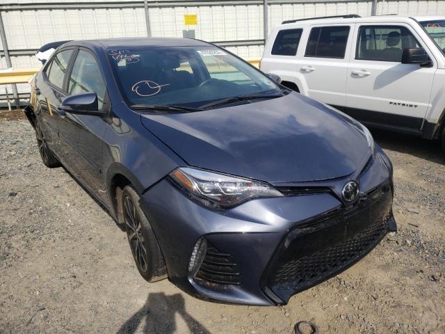 TOYOTA COROLLA L 2017 with VIN 5YFBURHE0HP709935 - Photo from auction