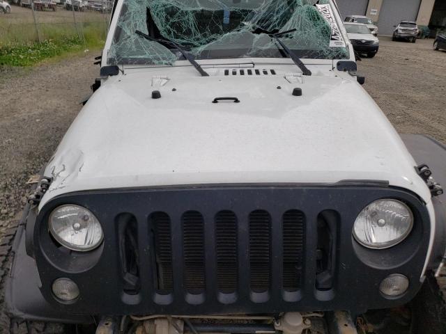 Photo 7 from auction – 2014 JEEP WRANGLER U with VIN 1C4BJWFG0EL282417