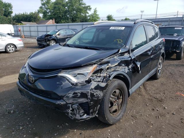 Photo 2 from auction – 2017 TOYOTA RAV4 LE with VIN 2T3BFREV7HW579057