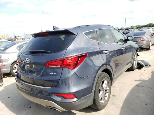Photo 4 from auction – 2017 HYUNDAI SANTA FE S with VIN 5NMZU3LB6HH019335