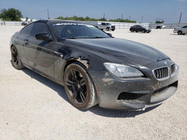 BMW M6 2014 with VIN WBSLX9C53ED160077 - Photo from auction