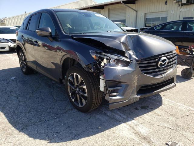 MAZDA CX-5 GT 2016 with VIN JM3KE4DY3G0916304 - Photo from auction