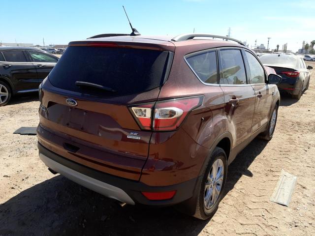 Photo 4 from auction – 2018 FORD ESCAPE SE with VIN 1FMCU0GD2JUC09532