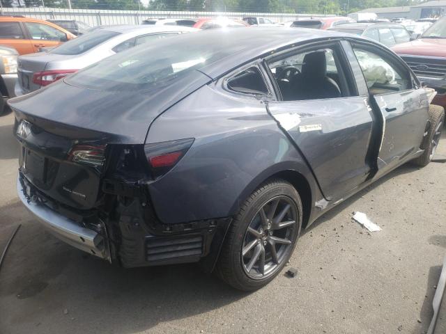 Photo 4 from auction – 2021 TESLA MODEL 3 with VIN 5YJ3E1EB7MF054904