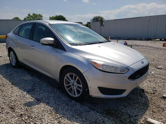 FORD FOCUS SE 2017 with VIN 1FADP3F21HL298517 - Photo from auction