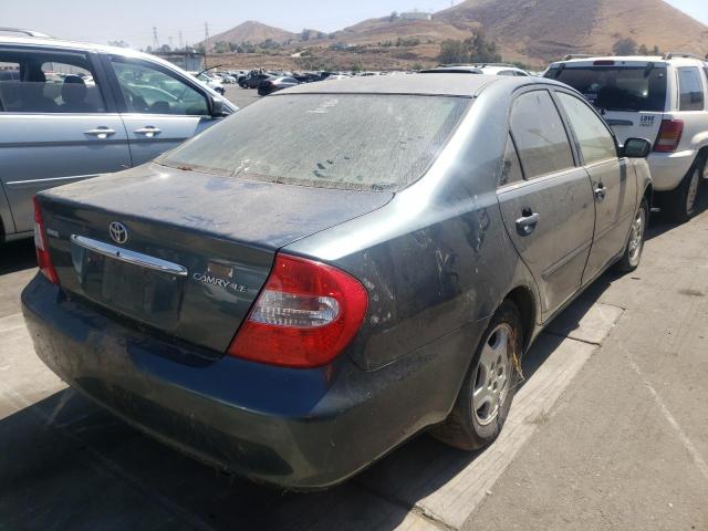 Photo 4 from auction – 2002 TOYOTA CAMRY LE with VIN JTDBE32K120033277