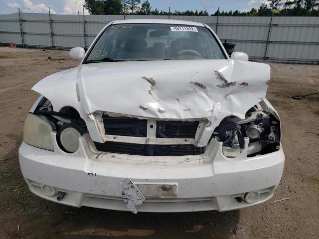 Photo 9 from auction – 2006 KIA OPTIMA LX with VIN KNAGD128465463795