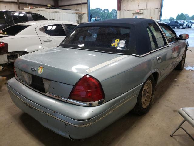 Photo 4 from auction – 2002 FORD CROWN VICT with VIN 2FAFP74W12X100180