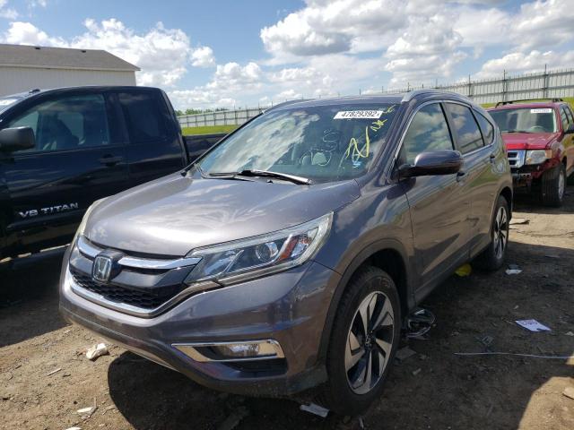 Photo 2 from auction – 2016 HONDA CR-V TOURI with VIN 5J6RM4H96GL129790