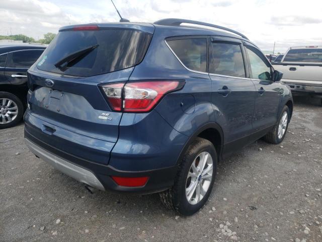 Photo 4 from auction – 2018 FORD ESCAPE SE with VIN 1FMCU9GD0JUC40475